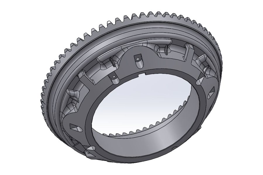 Isometric CAD model of a large-diameter girth gear ring for a crushing mill, showing external gear teeth, a pocketed web with radial stiffening ribs and a counterbored mounting flange (view 1 of 3)